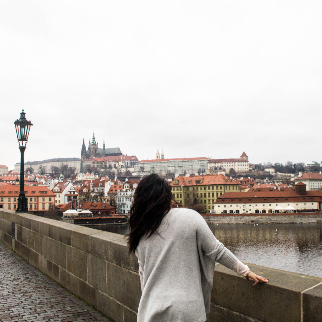 Solo women on Charles Bridge in Prague 